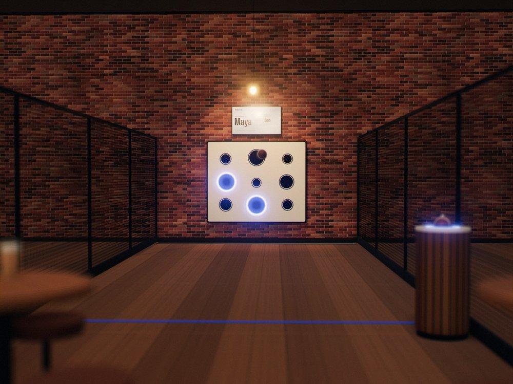 One Third Zone wall at the end of its own bay in a brick taproom. Two targets are lit blue, the screen above shows that Maya is playing, and a football is in flight. The blue line on the floor is 8 meters from the wall, black sports nets close off the bay on both sides, the ball comes back up in a column by that line, and high-top tables wait behind it.